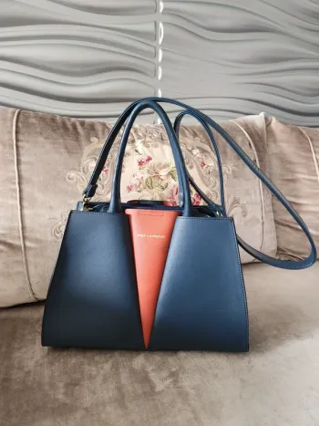 Sac à main – Bicolore bleu marine et brique ted lapidus – Comme neuf