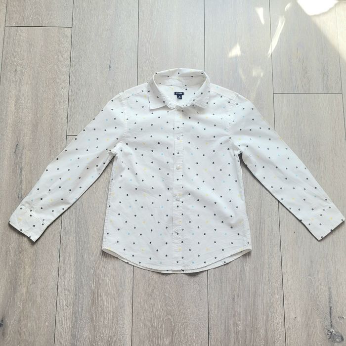 Chemise blanc cassé à motif bateaux. Garçon 8 ans. Marque Kiabi