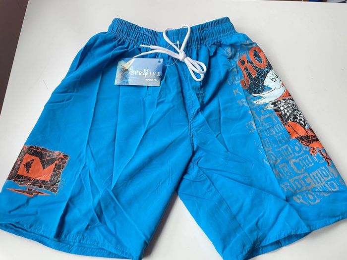 Short de bain bleu taille 14 ans