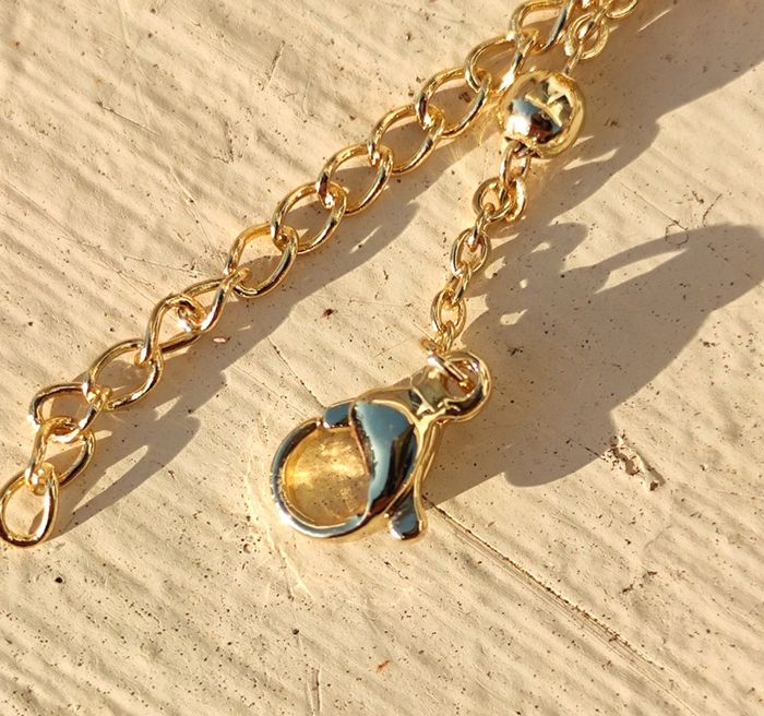 Collier doré étoile - photo numéro 4