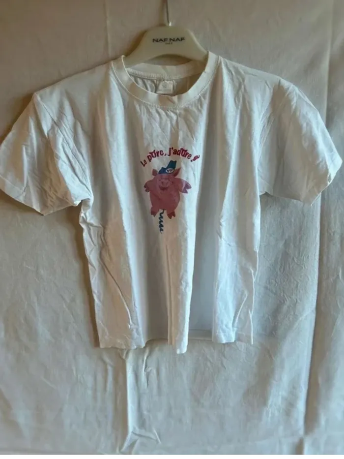 Tee  shirt comiques Le  porc j’adore  taille  10 ans  en  très  bon état