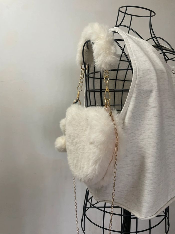 Sac à main élégant en fourrure synthétique avec poignée supérieure et bandoulière - photo numéro 19