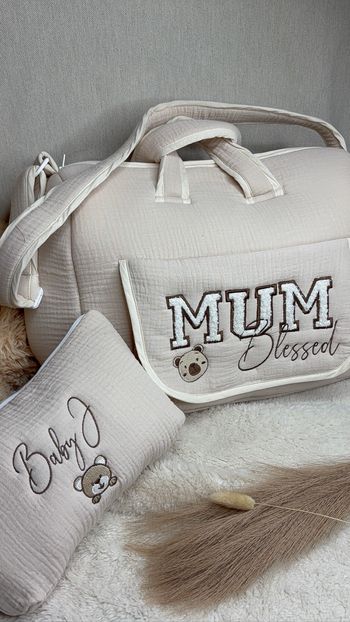 Sac à langer + trousse de toilettes