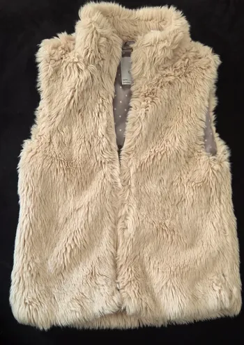 Gilet sans manche T.8 ans