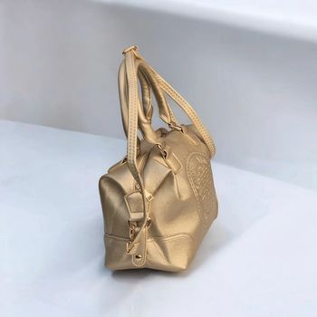 Sac à main doré chic - style bowling vintage
