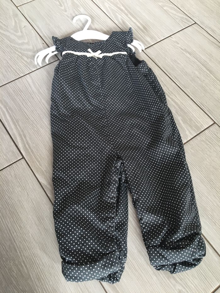 Combinaison noir à pois blancs
