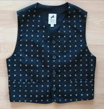 Boléro gilet sans manches noir 6 ans