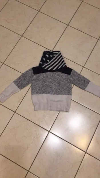 Pull col montant