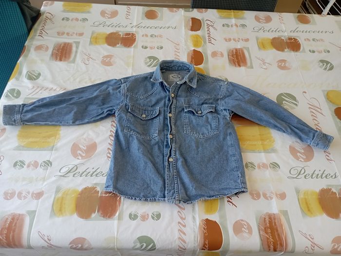 Chemise bleu en jean manches longues à pressions Armando Club 6 ans 2€