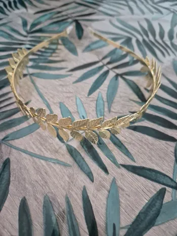 Serre tête couronne feuille doré