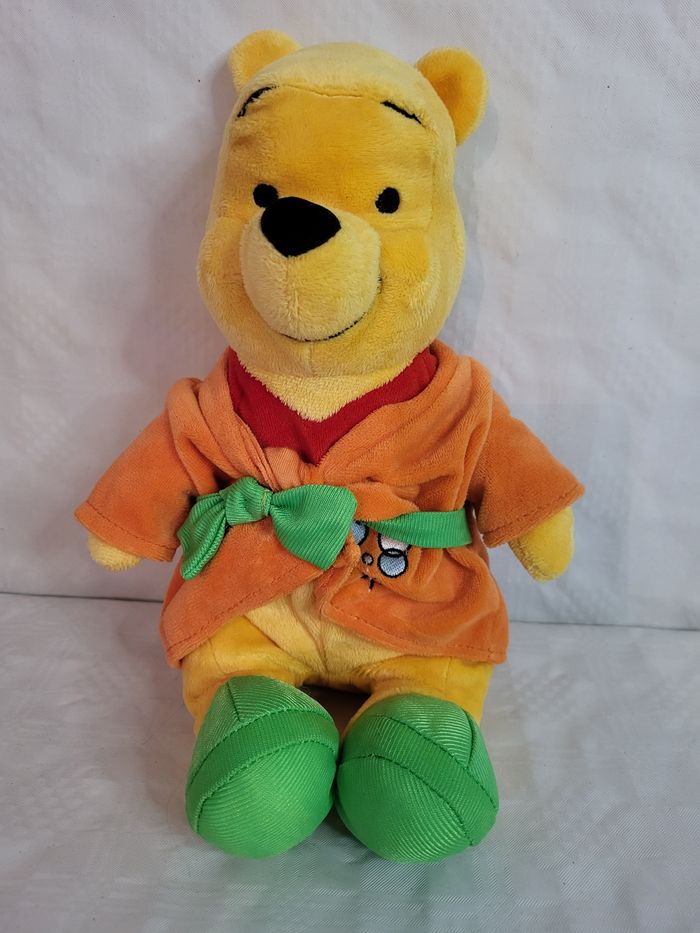 Peluche winnie l’ourson en peignoir