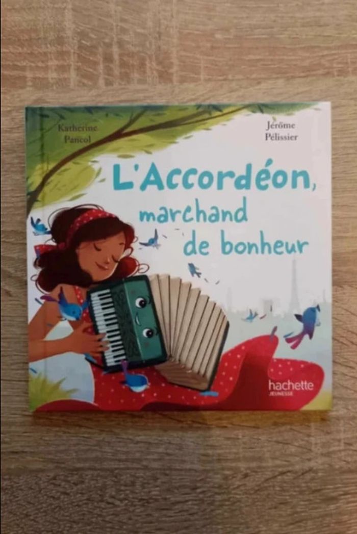 livre Mc donald l'accordéon marchand de bonheur Très bon état