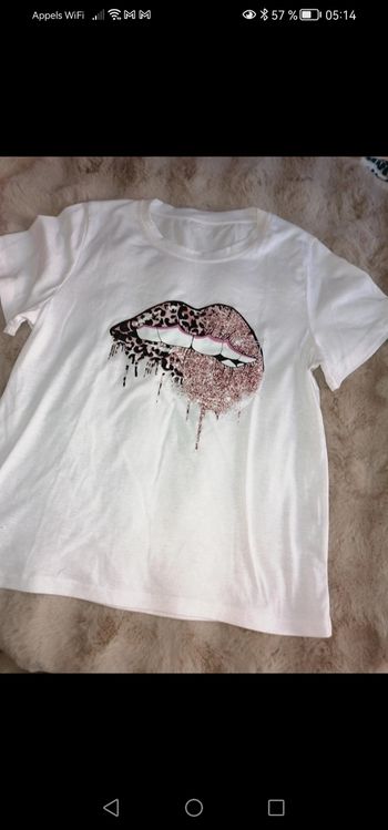 T. Shirt blanc motif bouche léopard taille S neuf