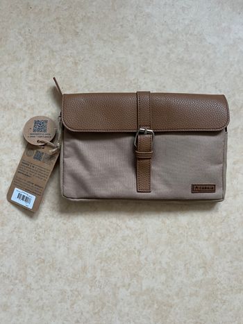 Pochette cabaïa pour sac à dos neuf Jamais utilisé avec étiquette