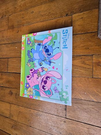 Puzzle 99 pieces stitch et angel pâques 