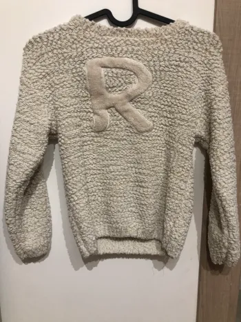 Pull blanc cassé et doré