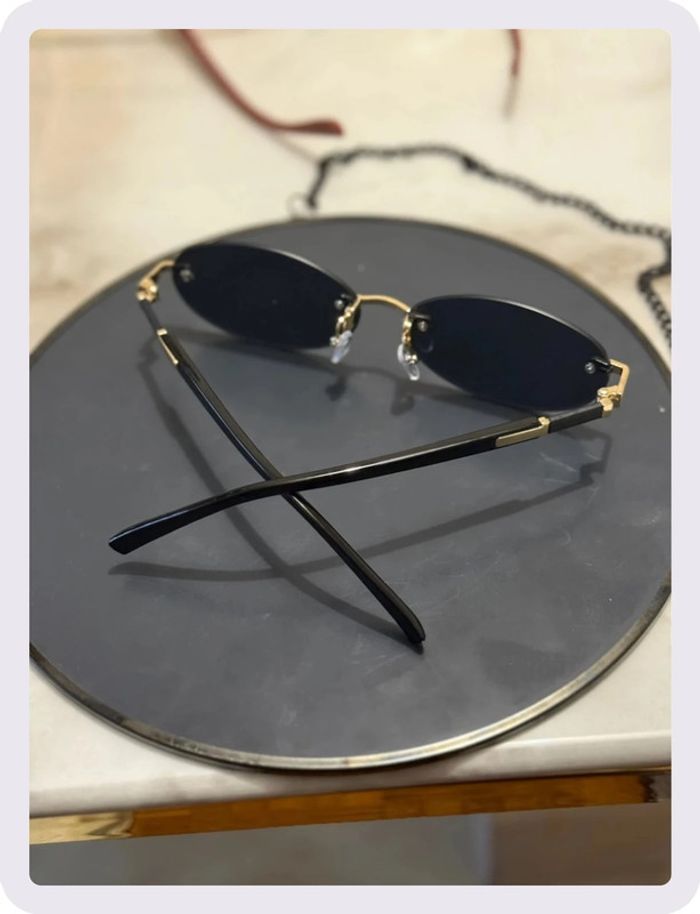 Lunette de soleil ovale noire - photo numéro 4