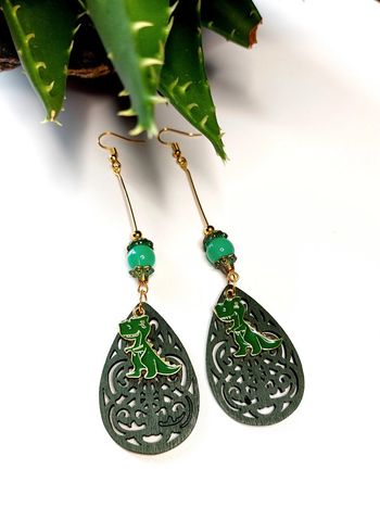 Magnifique paire de boucles d'oreilles pendantes dinosaures