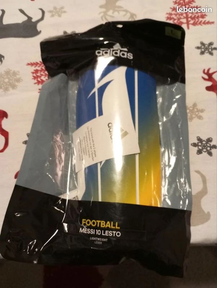 Protège tibias neufs Adidas Messi 10 lesto