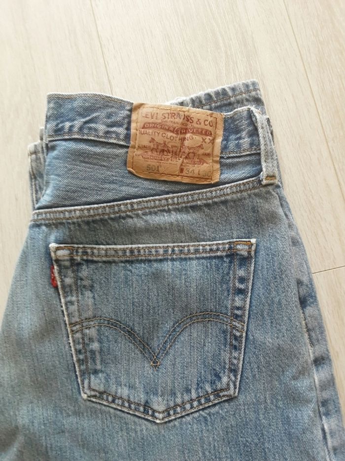Pantalon jean marque Levi s strauss taille w  34 l 30 fermeture bouton
