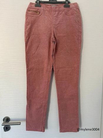 Pantalon en velours rose clair à fermeture éclairs sur les poches