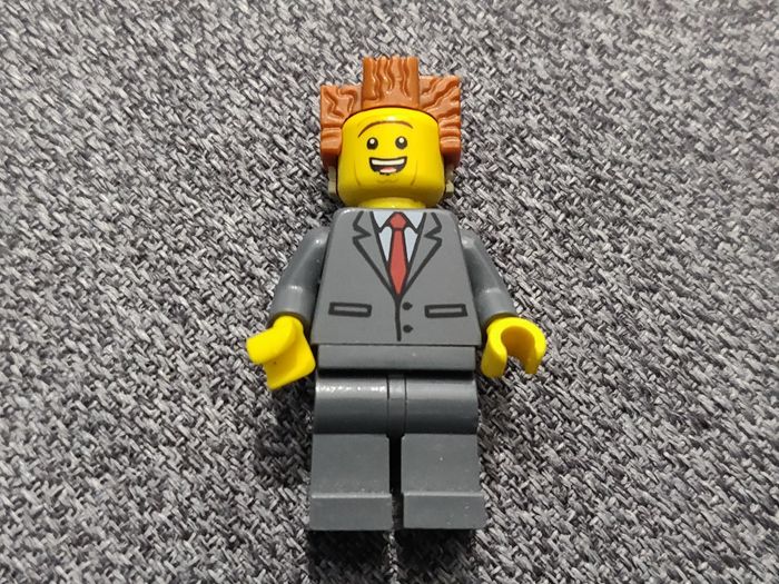Minifig Lego President Business - Lego Movie - Vrai Lego - tête en partie effacée