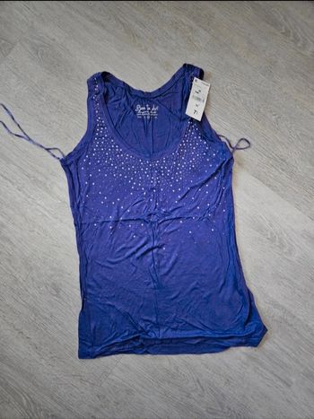 Débardeur femme
Neuf avec étiquettes