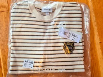 Pull "Lacoste" Blanc à rayures Taille XL neuf sous blister 100 % coton organique.