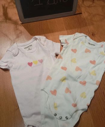 Lot de 2 body Orchestra taille 1 an en très bon état