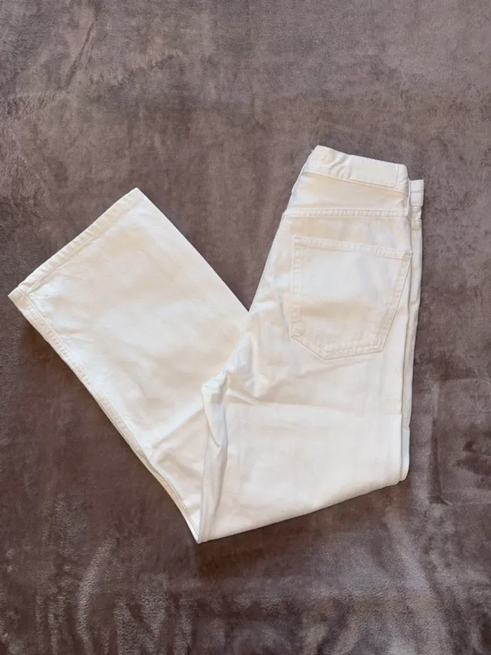 Jean blanc mango à jambes larges taille 34 femme en très bon état - photo numéro 2