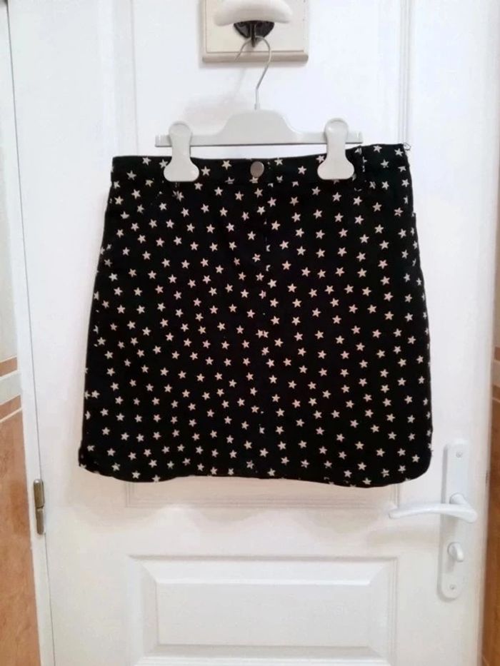 Jupe noire étoiles beiges T.12 ans - sans marque