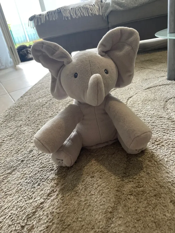 Peluche musicale flamme l’Éléphant
