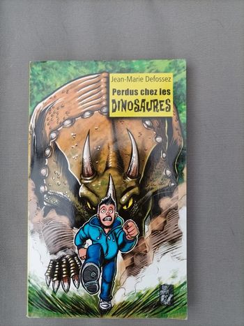 Livre "perdus chez les dinosaures" neuf