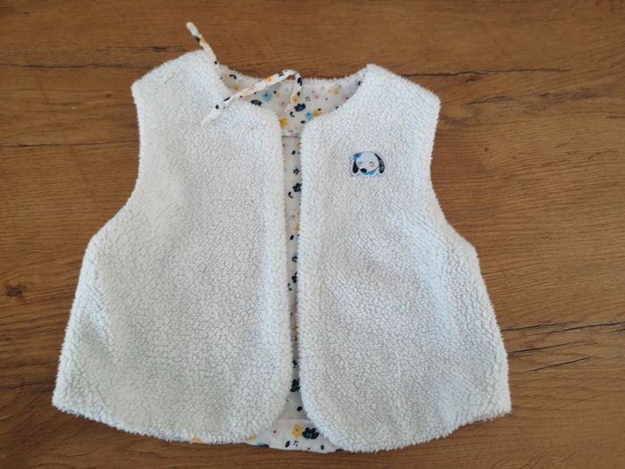 Gilet sans manches réversible 12 mois