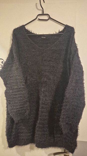 Joli pull noir classe