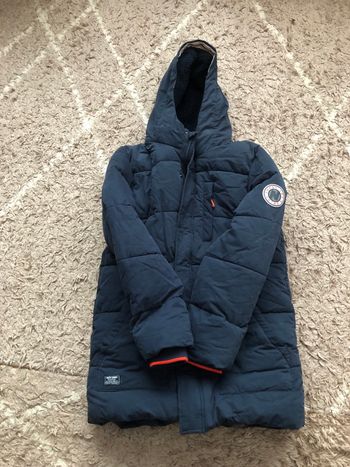 Manteau  de garçon tape à l’œil 