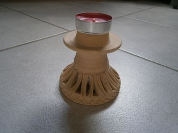 Repose bougie en terre cuite beige