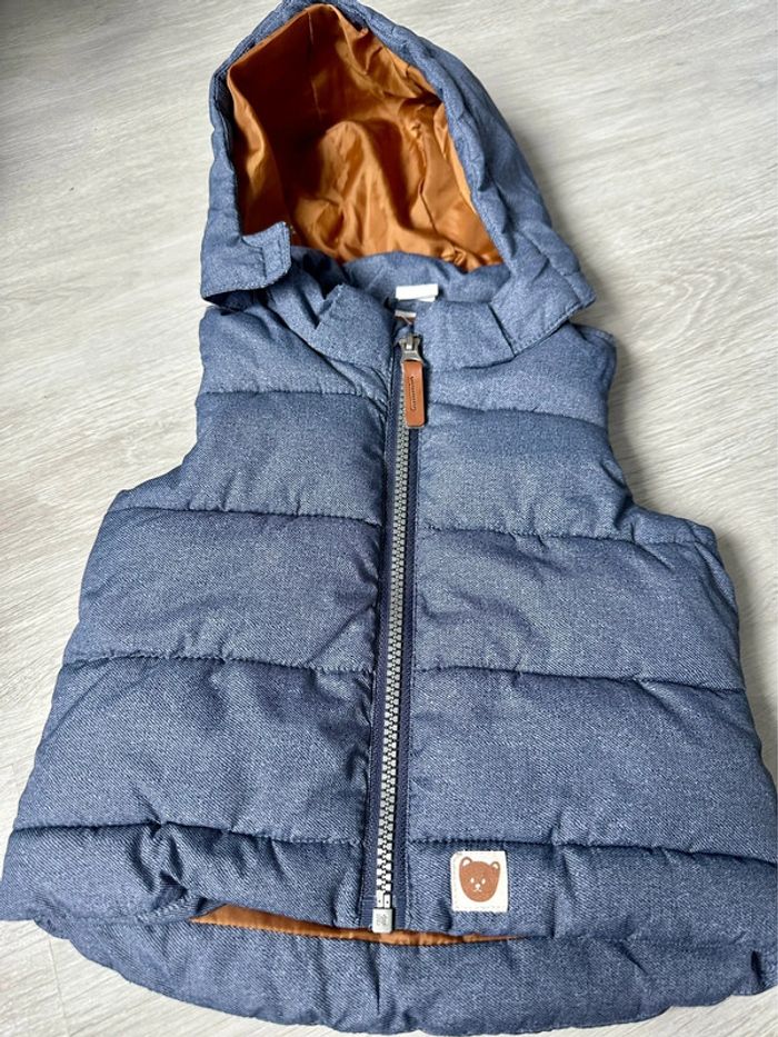 Doudoune sans manches.