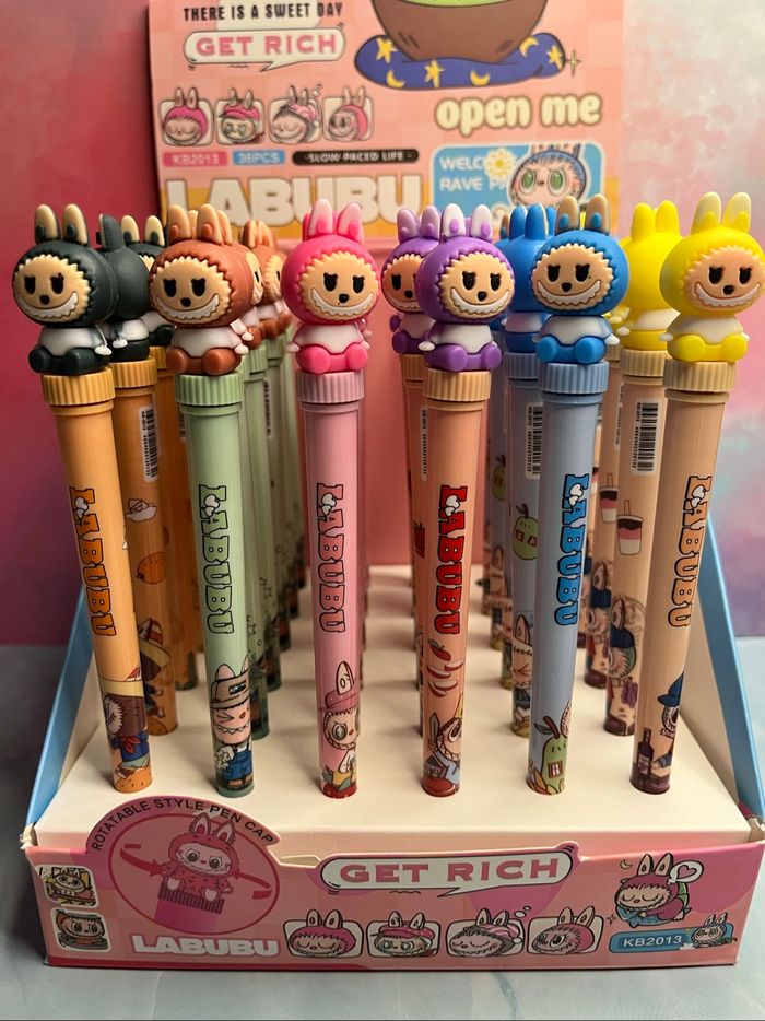 Stylo labubu avec la tête qui tourne