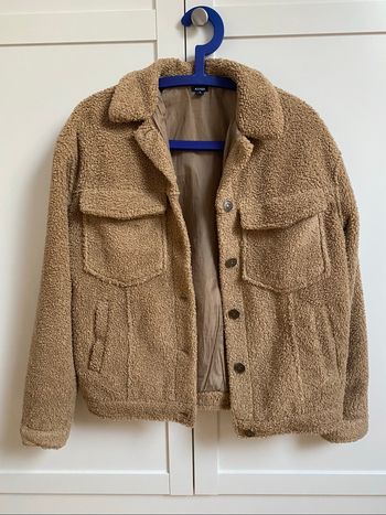 Manteau fausse fourrure beige