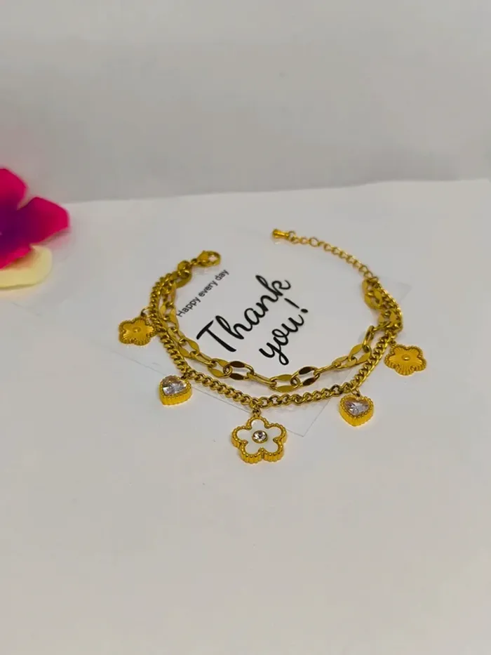 Bracelet doré et blanc nacré avec coeurs et fleurs - photo numéro 6