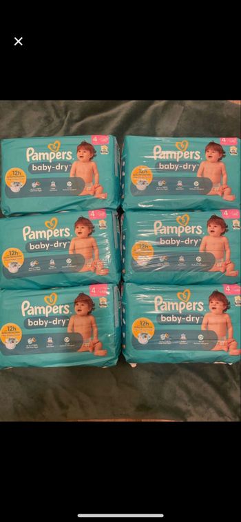 Six paquets de couches pampers baby dry taille 4