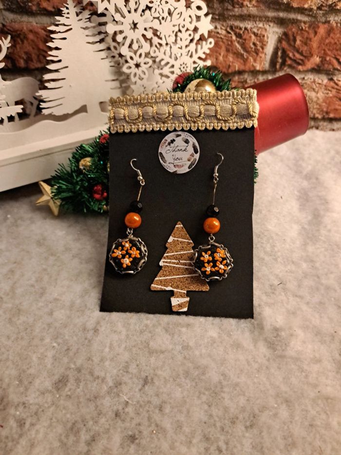 Boucles d'oreilles pendante pâte polymere noir et orange