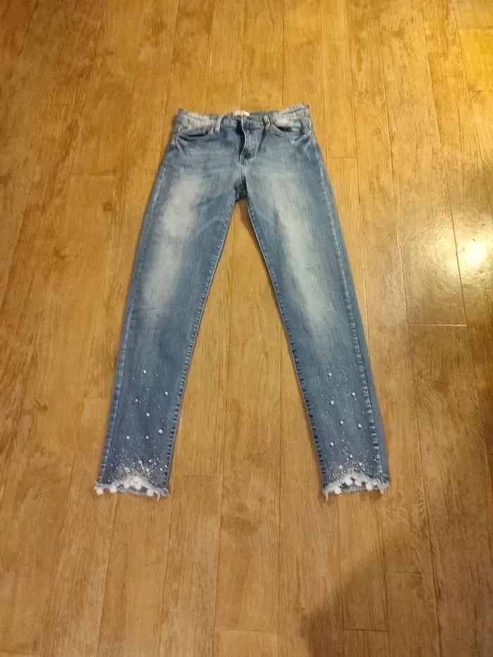 Jeans strass sur le bas