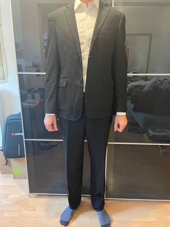 Costume noir Kos’sons