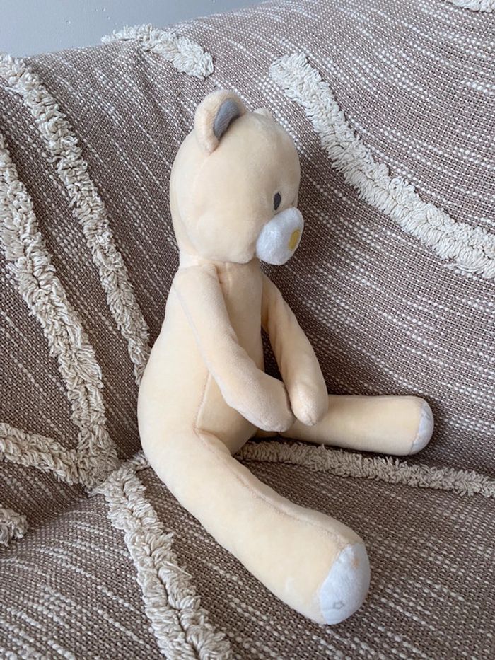 Peluche doudou 26cm Tom et kiddy obaibi ours jaune étoile très bon état - photo numéro 3