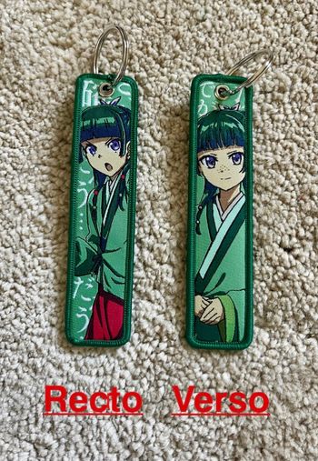 Un porte clés brodé  « Les carnets de l’apothicaire » neuf 