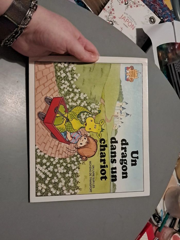 Livre un dragon dans un chariot