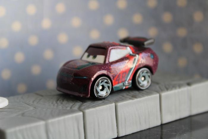 Disney Pixar cars mini racer Aaron clocker