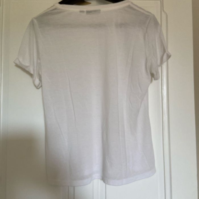 Tee shirt ornement strass poche poitrine - photo numéro 3